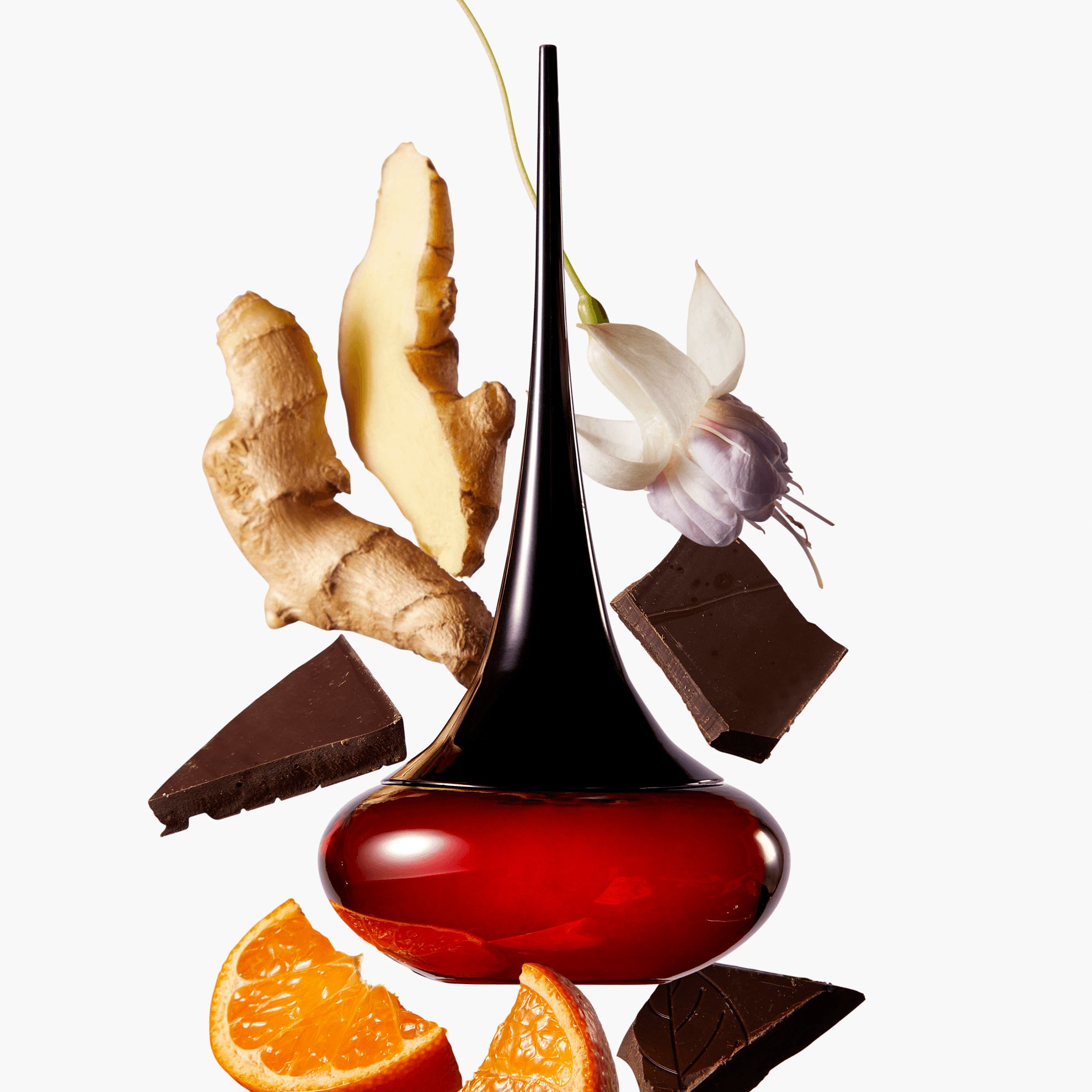 Một chai dung dịch có hình ảnh cam và sô cô la.